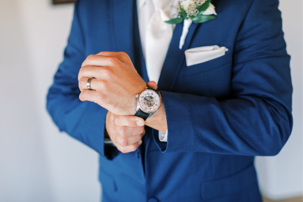 groom getting ready with watch