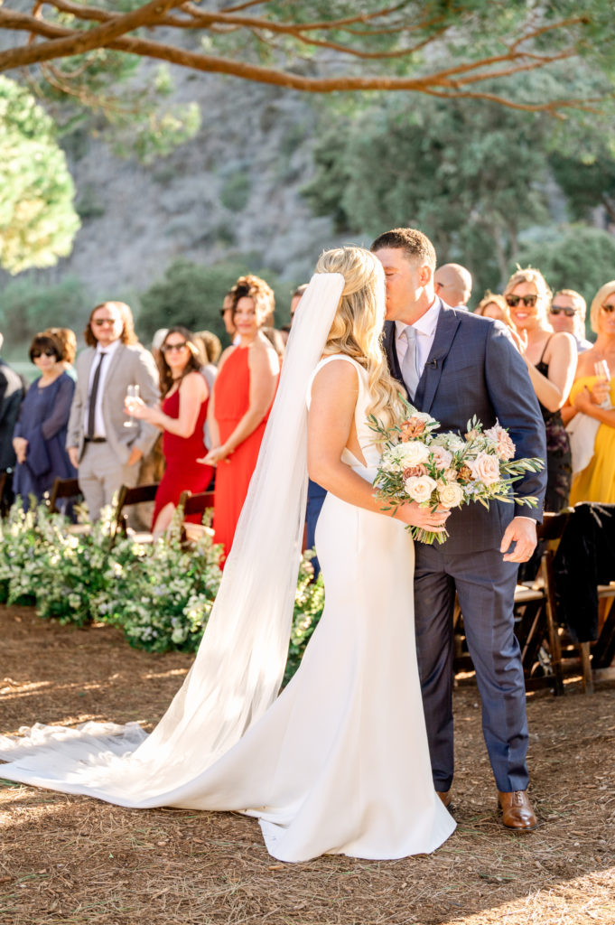The Ranch Laguna Beach wedding end of aisle kiss