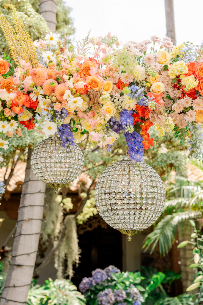 casa romantica wedding with disco balls and colorful flowers