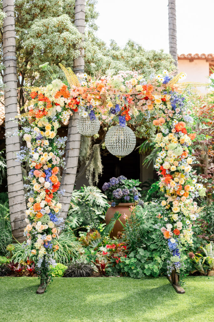 casa romantica wedding with disco balls and colorful flowers